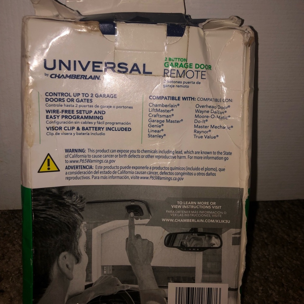 Garage door remote new the box is pushed in never used new